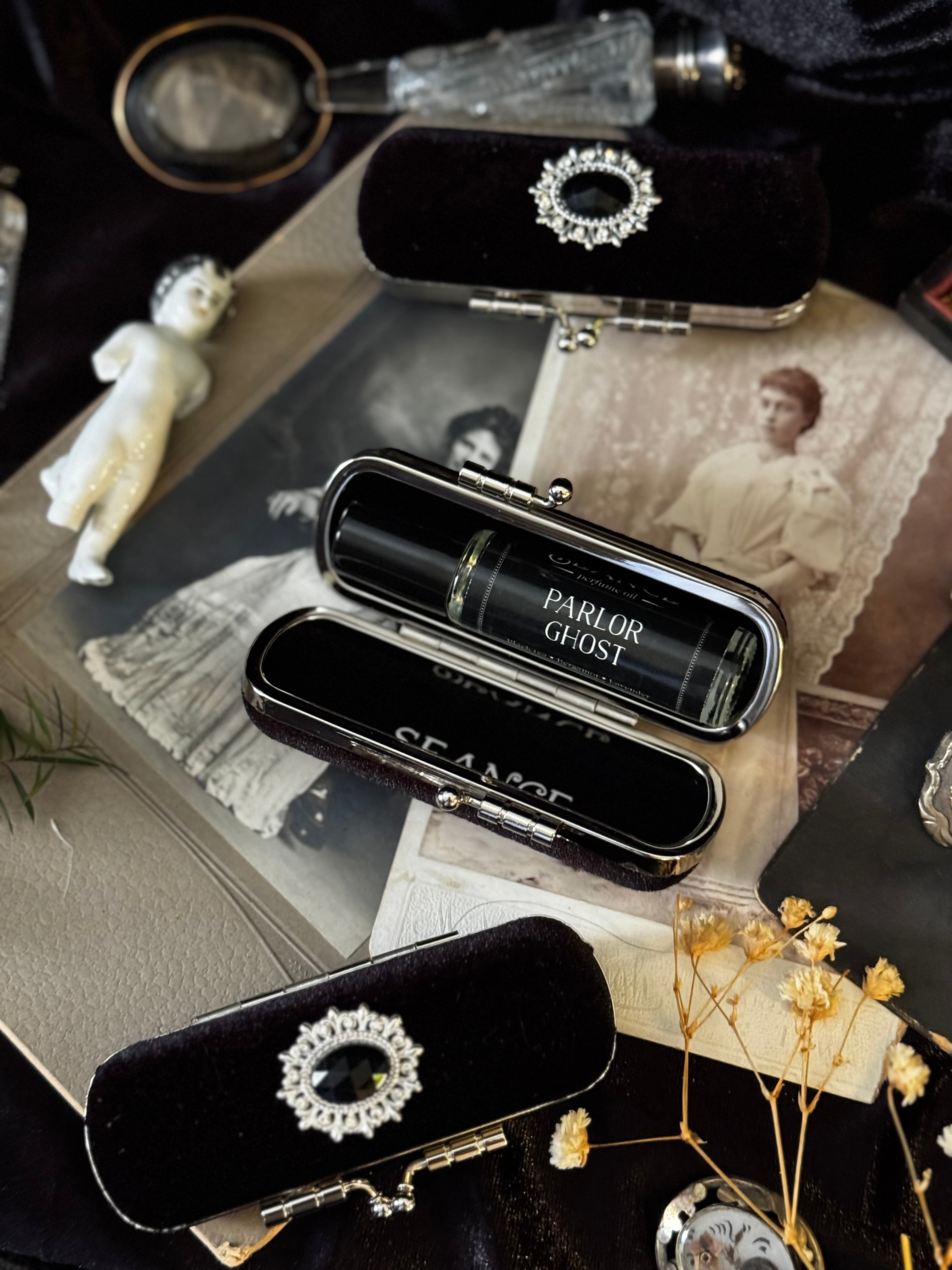 The Mourning Compact - perfume carry case.
