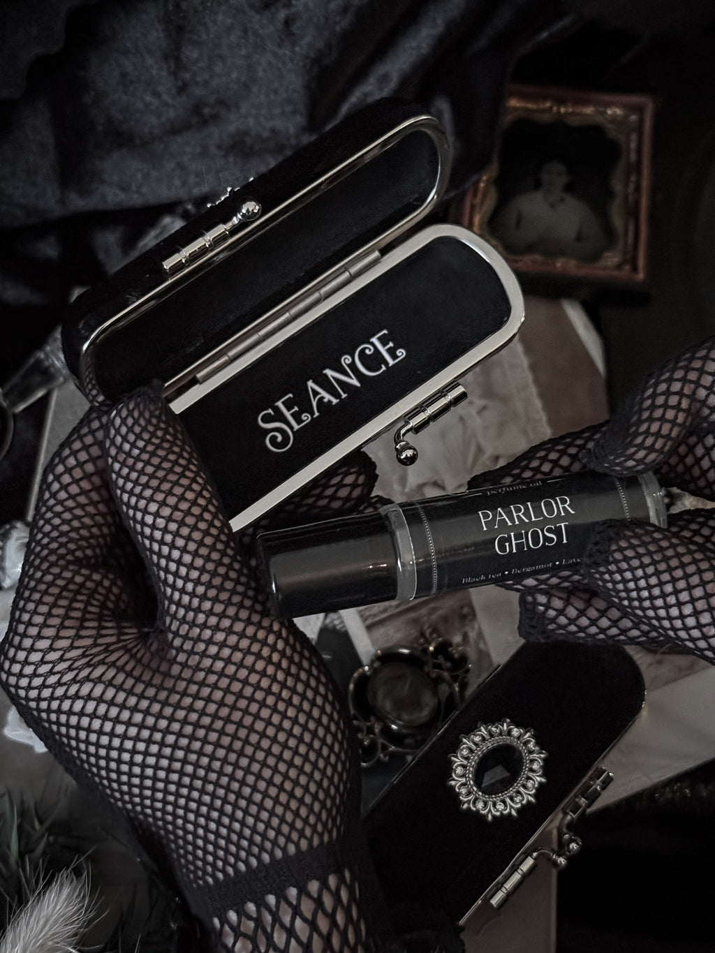 The Mourning Compact - perfume carry case.