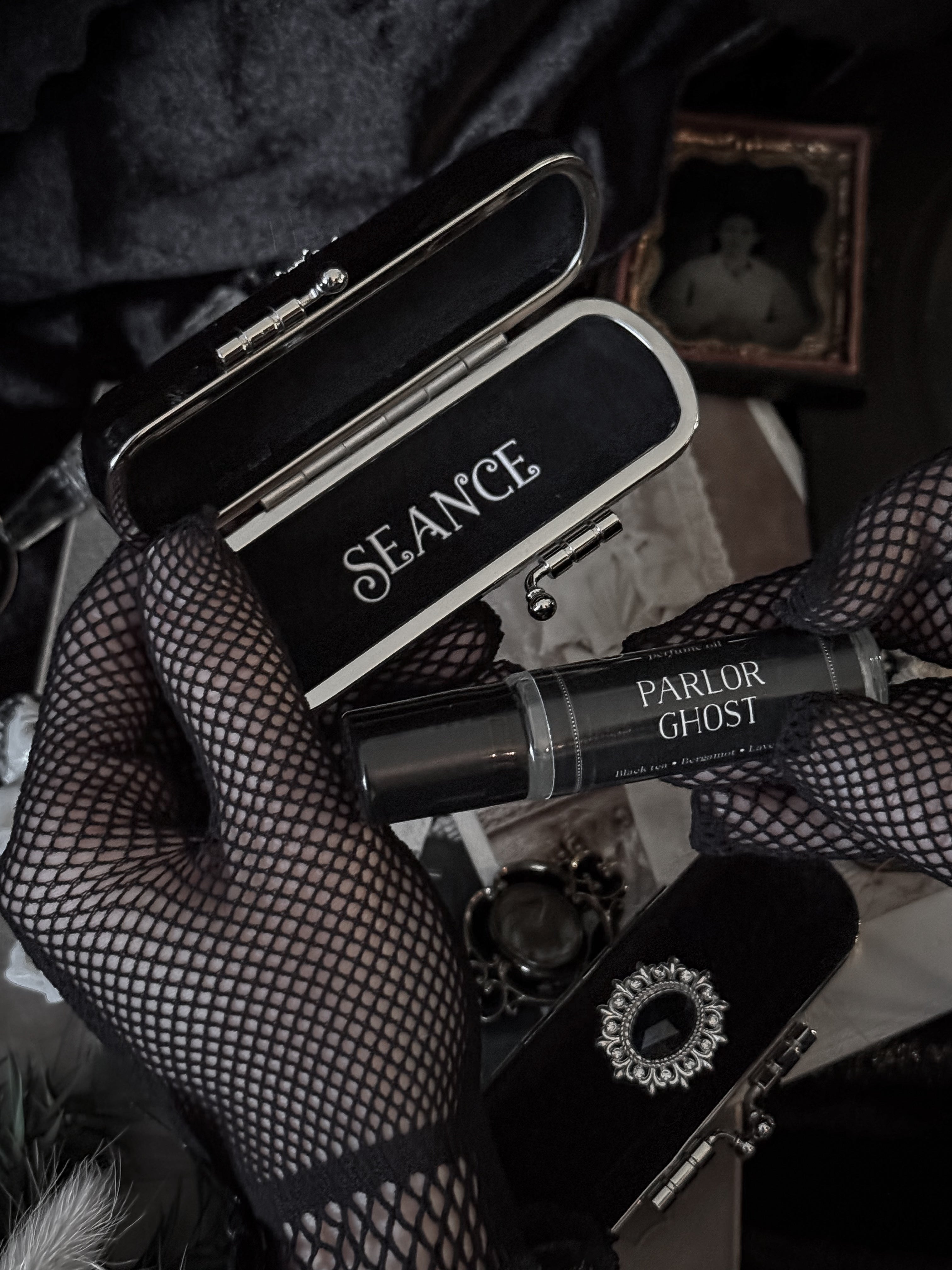 The Mourning Compact - perfume carry case.