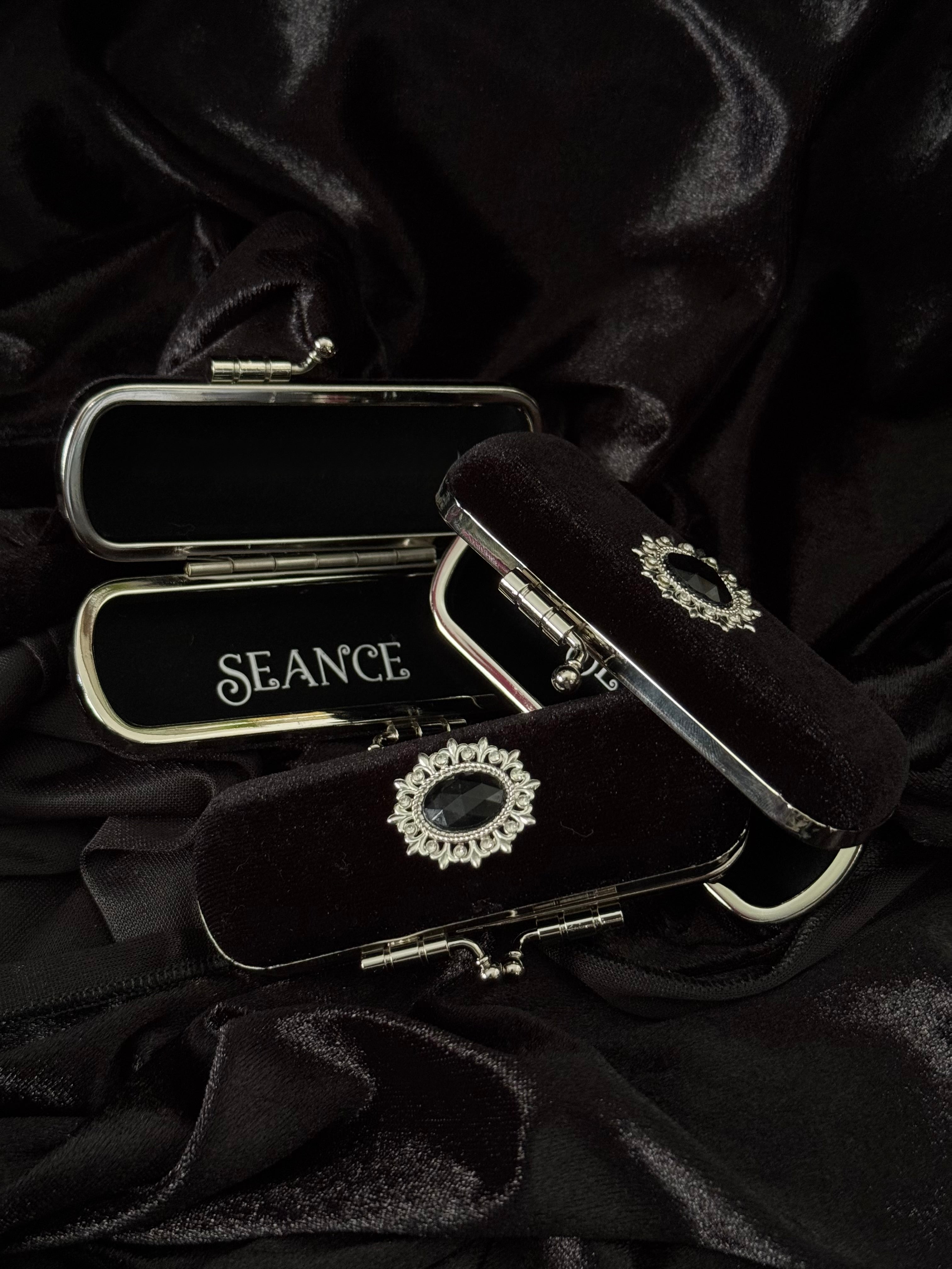 The Mourning Compact - perfume carry case.