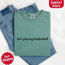 He’s Playing Basketball – Funny Sports Girlfriend Comfort Color Shirt for Women