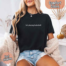 He’s Playing Basketball – Funny Sports Girlfriend Comfort Color Shirt for Women