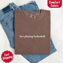 He’s Playing Basketball – Funny Sports Girlfriend Comfort Color Shirt for Women