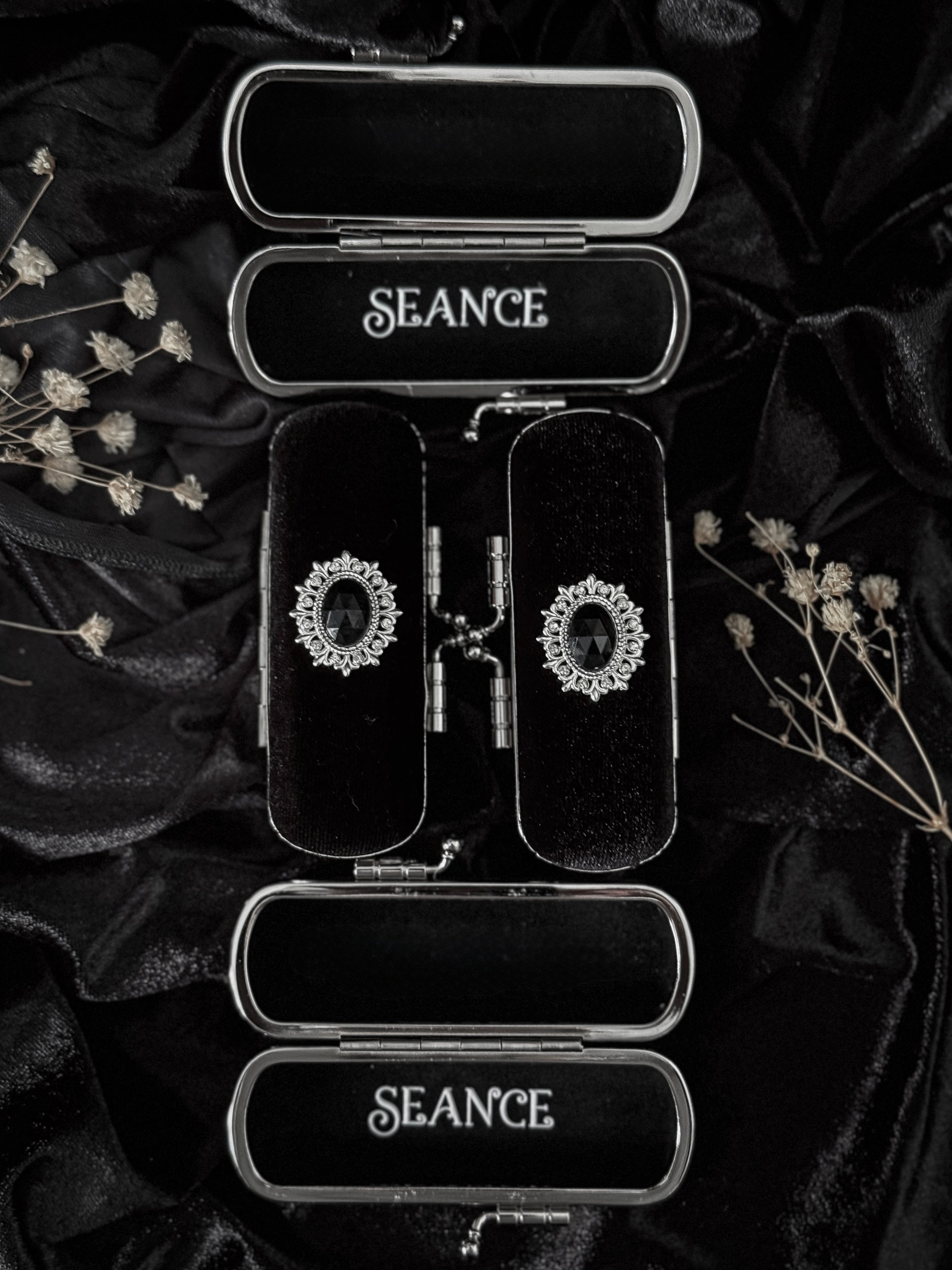 The Mourning Compact - perfume carry case.