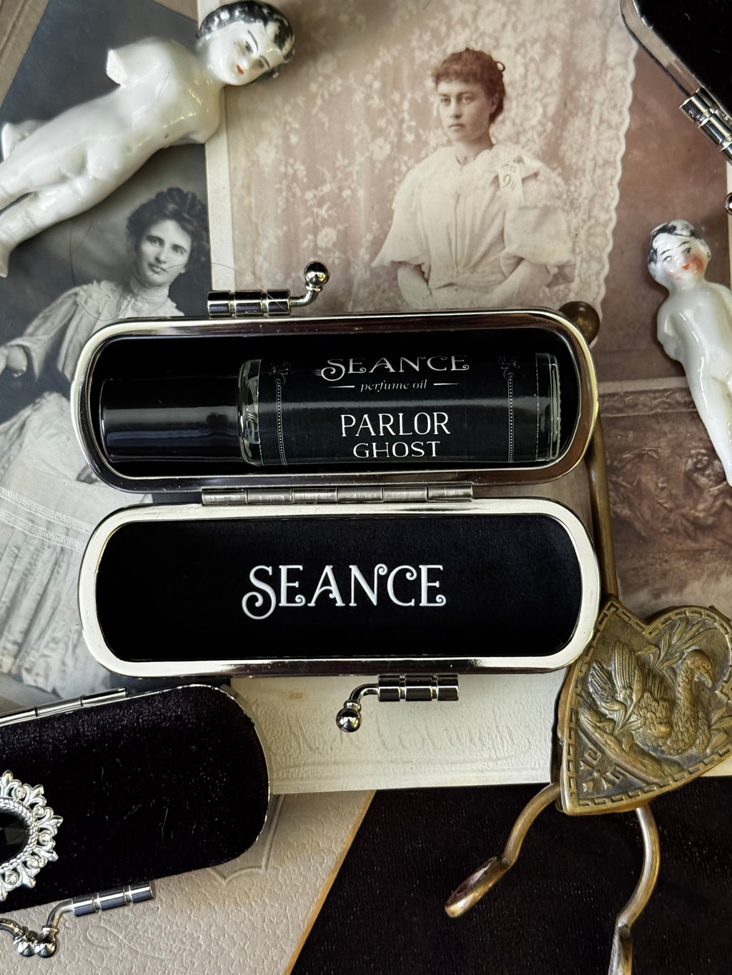 The Mourning Compact - perfume carry case.