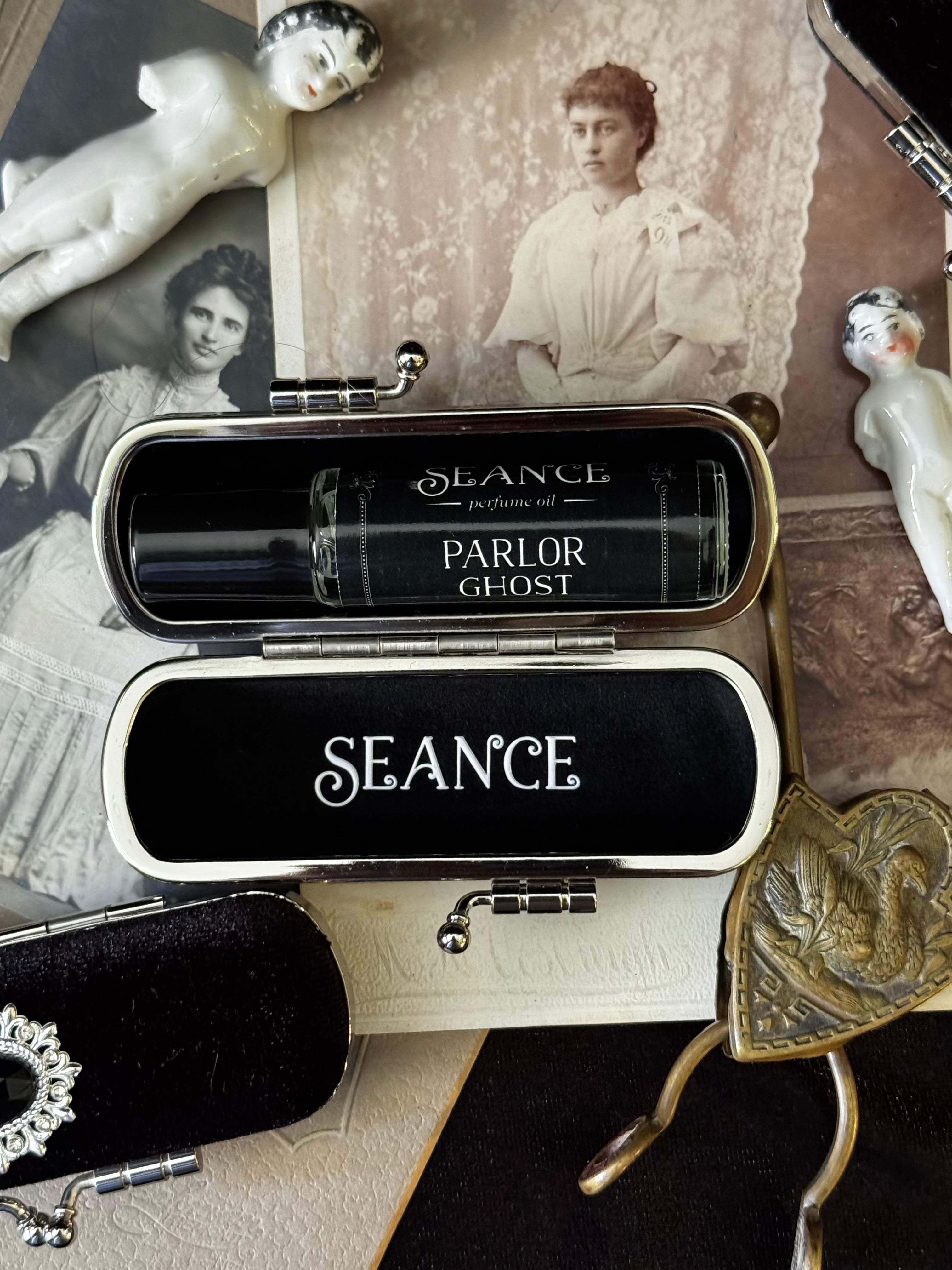 The Mourning Compact - perfume carry case.