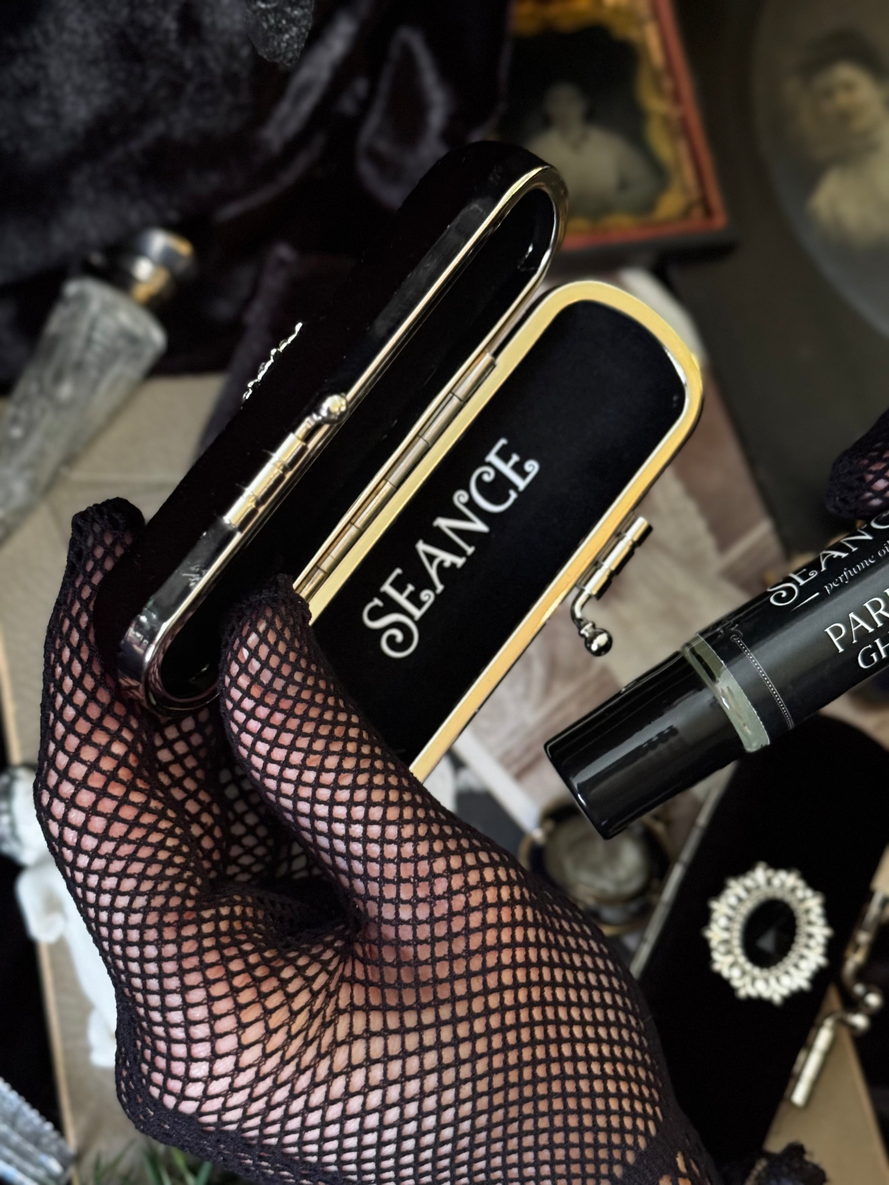 The Mourning Compact - perfume carry case.